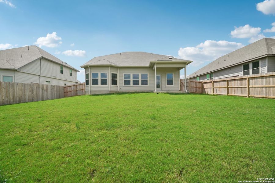 Front exterior of a new home in Legendary Trails - Classic Series, Cibolo, TX, highlighting curb appeal (Image 1). Front exterior of a new home in Legendary Trails - Classic Series, Cibolo, TX, highlighting curb appeal (Image 1).