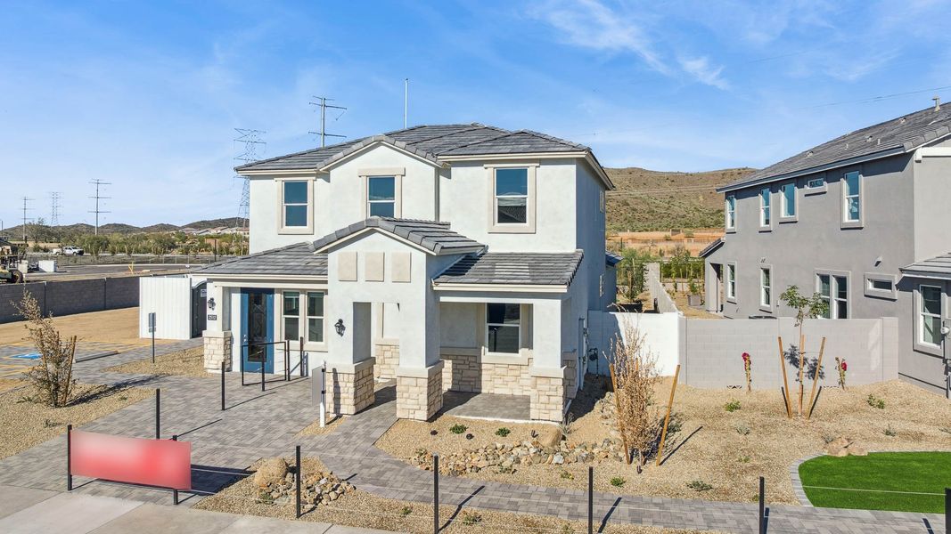 Representative exterior photo of a completed home built from the Apache by D.R. Horton in The Ridge at Stone Butte, Phoenix, AZ (Image 27).