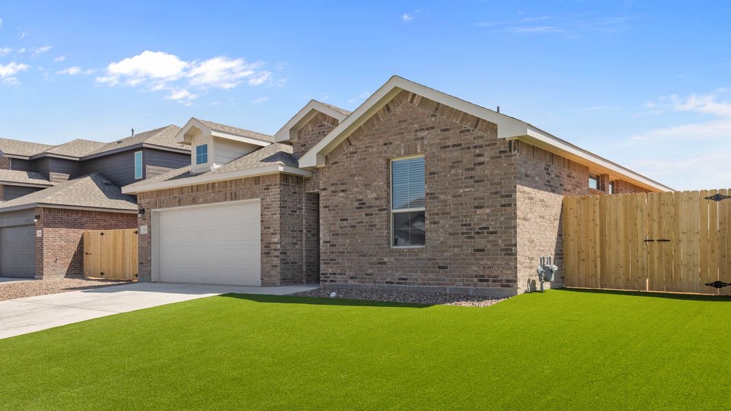 Representative exterior photo of a completed home built from the Cali by D.R. Horton in Legacy South, Midland, TX (Image 16).