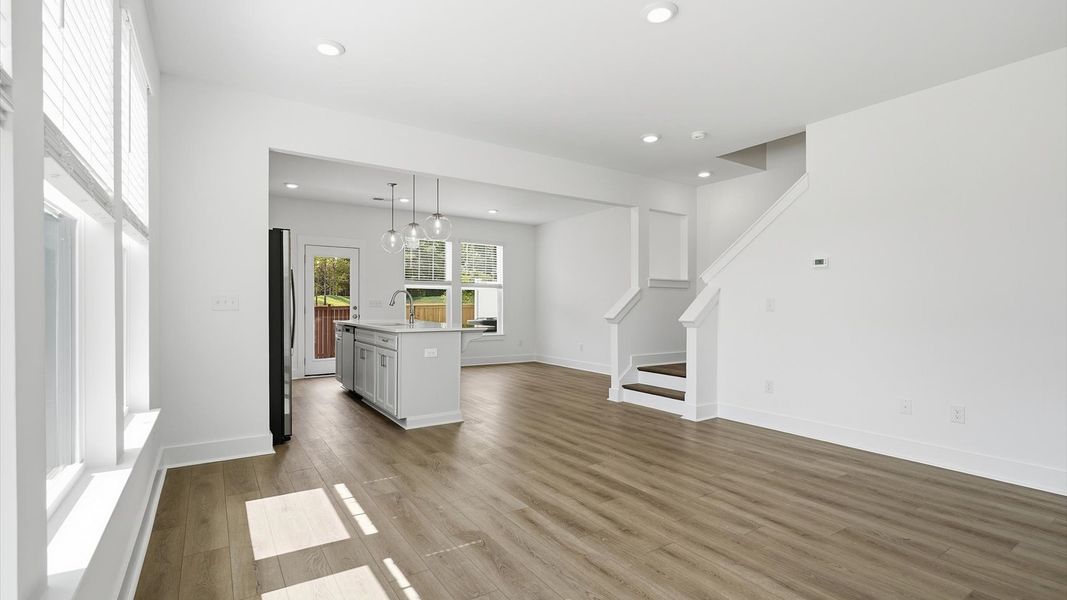 Tasteful family room with high ceilings, modern fixtures, and a warm, inviting feel near Downtown Fountain Inn