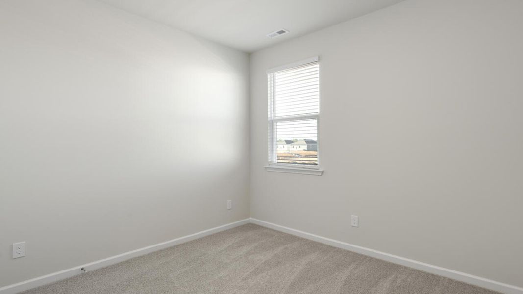 Spacious, unfurnished interior of a new home in The Grove at Blake Farm, Wilmington (Image 16).