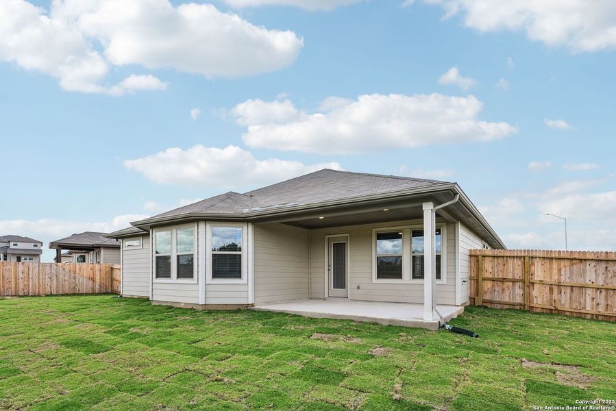 Front exterior of a new home in , Cibolo, TX, highlighting curb appeal (Image 2). Front exterior of a new home in , Cibolo, TX, highlighting curb appeal (Image 2).
