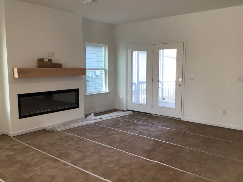 Family Room featuring the AW Collection® Coastal - Open and airy with soft-toned finishes.