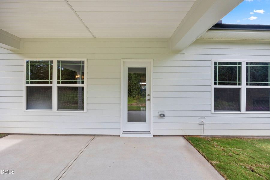 Exterior details and patio area of a home in Charlotte's Ridge, Middlesex (Image 3).
