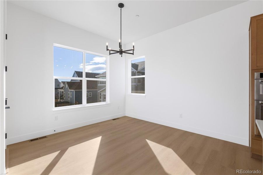 Spacious, unfurnished interior of a new home in Dillon Pointe - Journey, Broomfield (Image 18).