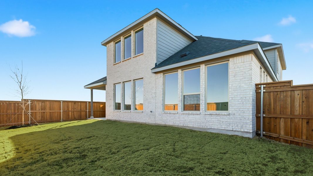 Exterior details and patio area of a home in Green Meadows Premier, Celina (Image 22). Exterior details and patio area of a home in Green Meadows Premier, Celina (Image 22).