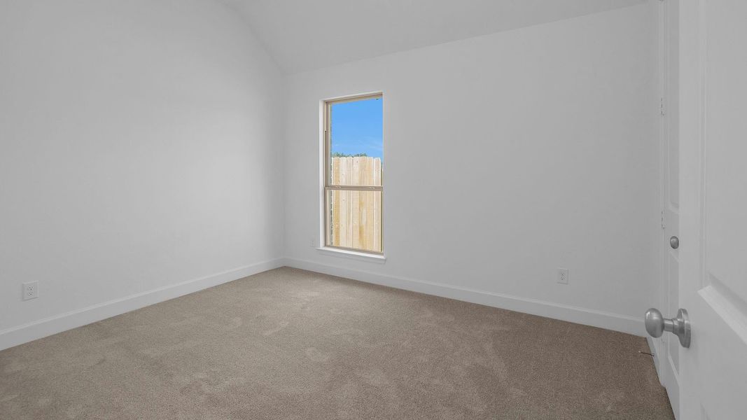 Spacious, unfurnished interior of a new home in Artavia 50', Conroe (Image 10).