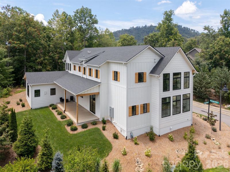Front exterior of a new home in , Asheville, NC, highlighting curb appeal (Image 27).