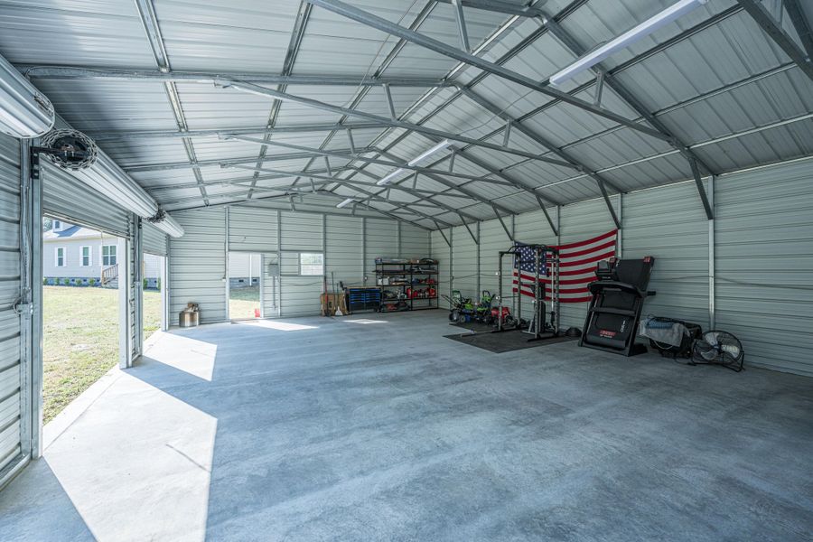 Exterior details and patio area of a home in , Cottageville (Image 25).