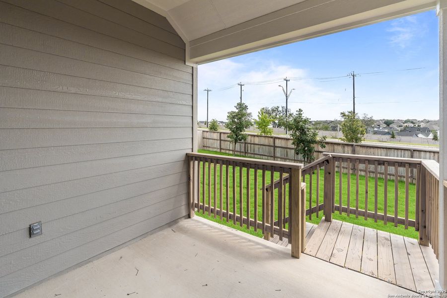 Exterior details and patio area of a home in Bison Ridge, San Antonio (Image 2).
