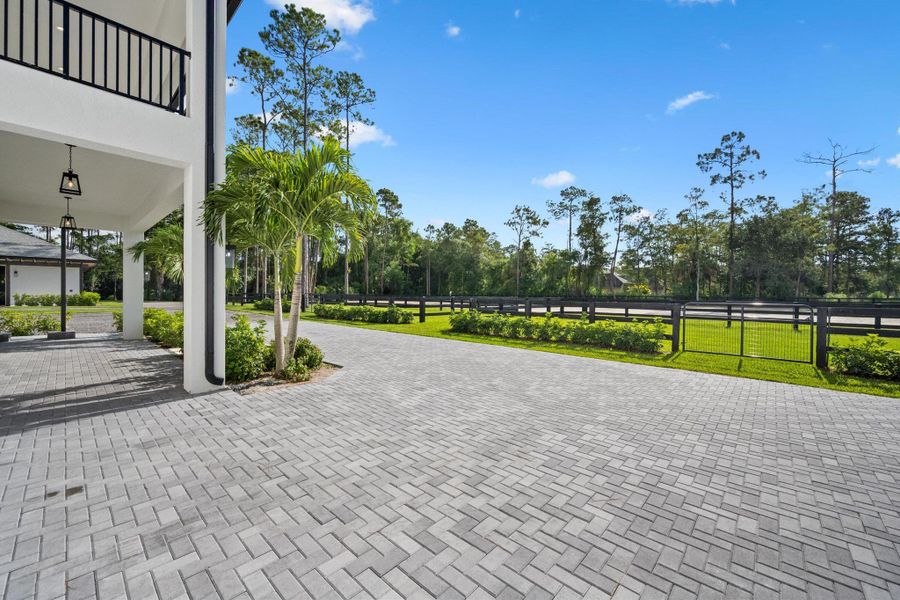 Front exterior of a new home in , Wellington, FL, highlighting curb appeal (Image 33).