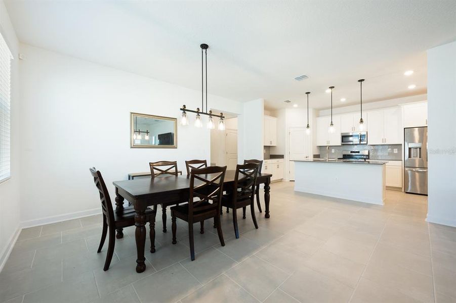 Furnished interior view inside a new home in Tohoqua, Kissimmee (Image 7).