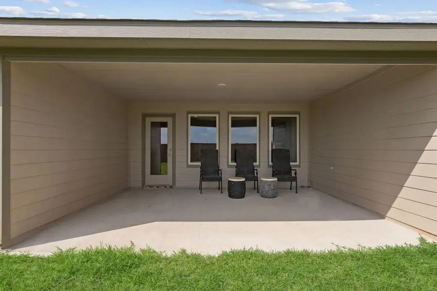 Exterior details and patio area of a home in Tamarron, Fulshear (Image 4). Exterior details and patio area of a home in Tamarron, Fulshear (Image 4).