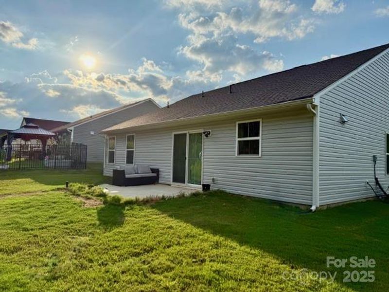 Exterior details and patio area of a home in Rosegate, Lancaster (Image 4).