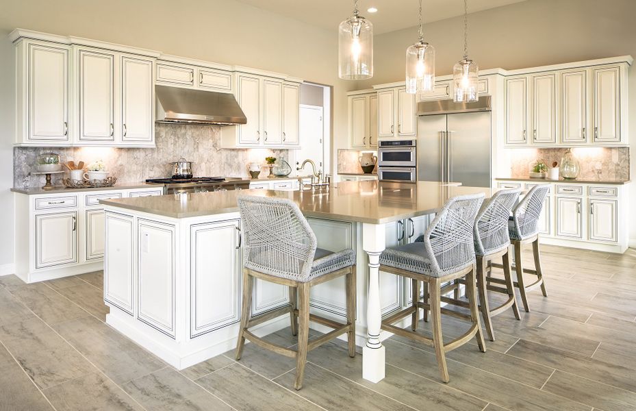 The kitchen is complete with an over-sized pantry and plenty of overhead lighting