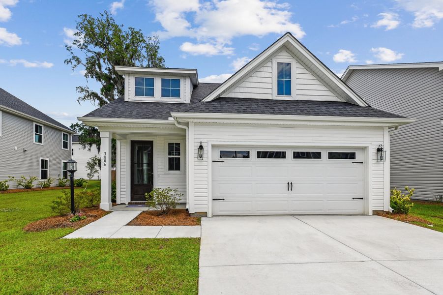 Front exterior of a new home in Windsor Crossing, North Charleston, SC, highlighting curb appeal (Image 22).