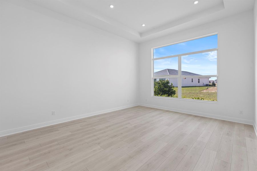 Furnished interior view inside a new home in PGA Village Verano, Port St. Lucie (Image 15).