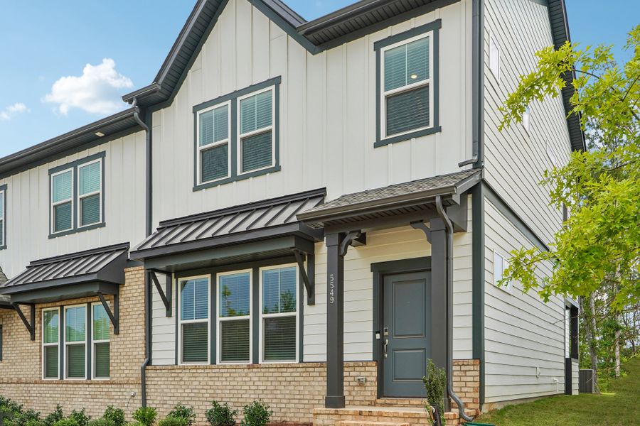 Exterior details and patio area of a home in Terraces at the Exchange, Indian Land (Image 22).