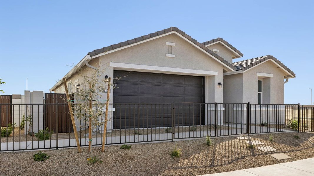 Representative exterior photo of a completed home built from the Canyon by D.R. Horton in Westpark, Buckeye, AZ (Image 25).