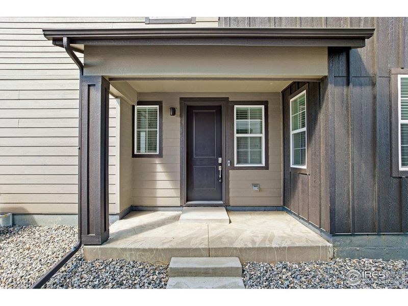 Exterior details and patio area of a home in Westside Crossing, Berthoud (Image 29).