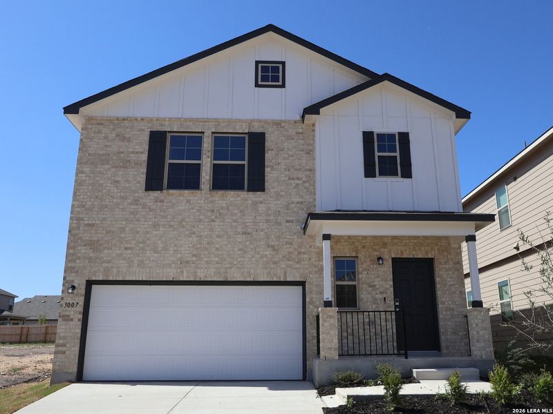 Front exterior of a new home in Paloma Park, Converse, TX, highlighting curb appeal (Image 21).