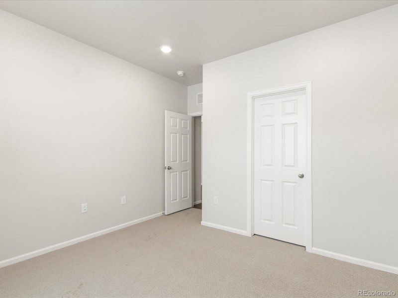 Spacious, unfurnished interior of a new home in Poudre Heights: The Alpine Collection, Windsor (Image 24).