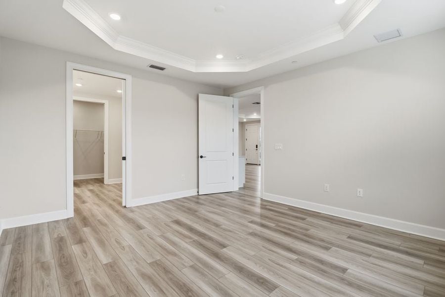Spacious, unfurnished interior of a new home in Esplanade by the Islands Coach Homes, Naples (Image 15).