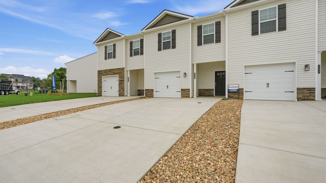 Exterior details and patio area of a home in Fieldcrest Acres Townhomes, Blountville (Image 3).