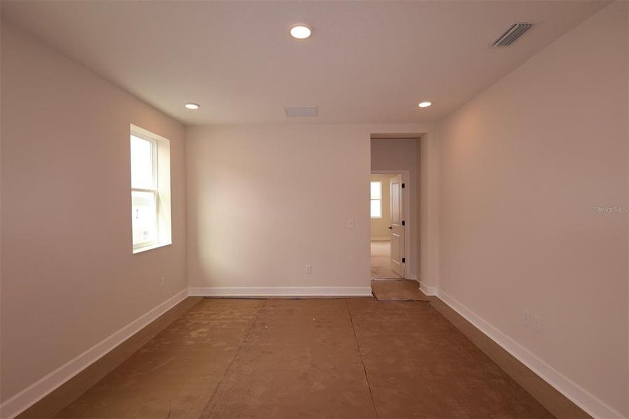 Spacious, unfurnished interior of a new home in Lake Star at Ovation, Winter Garden (Image 7).