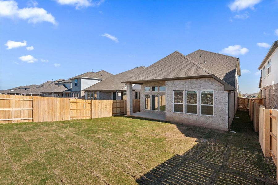 Exterior details and patio area of a home in Flora, Hutto (Image 3).