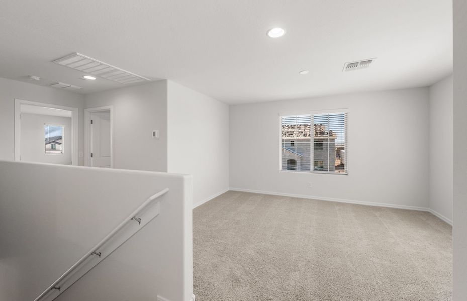 Spacious, unfurnished interior of a new home in Asante- Atrium Series, Surprise (Image 24).