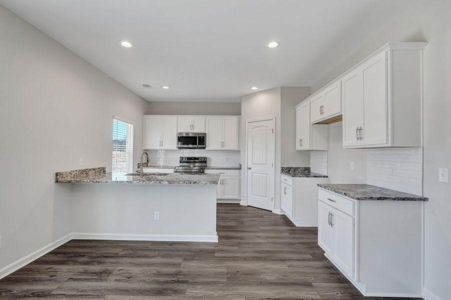 Representative furnished interior of a home built from the The Cypress by Smith Family Homes in Heritage at New Riverside, Bluffton (Image 7).