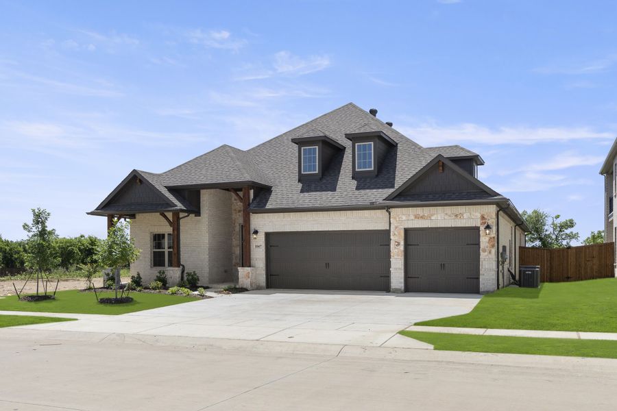 Representative exterior photo of a completed home built from the Cedarwood II by Sandlin Homes in Lakesong, Midlothian, TX (Image 22).