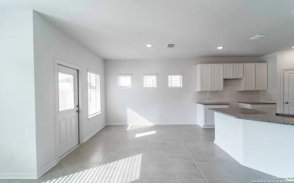 Spacious, unfurnished interior of a new home in Red Hawk Landing, San Antonio (Image 7).
