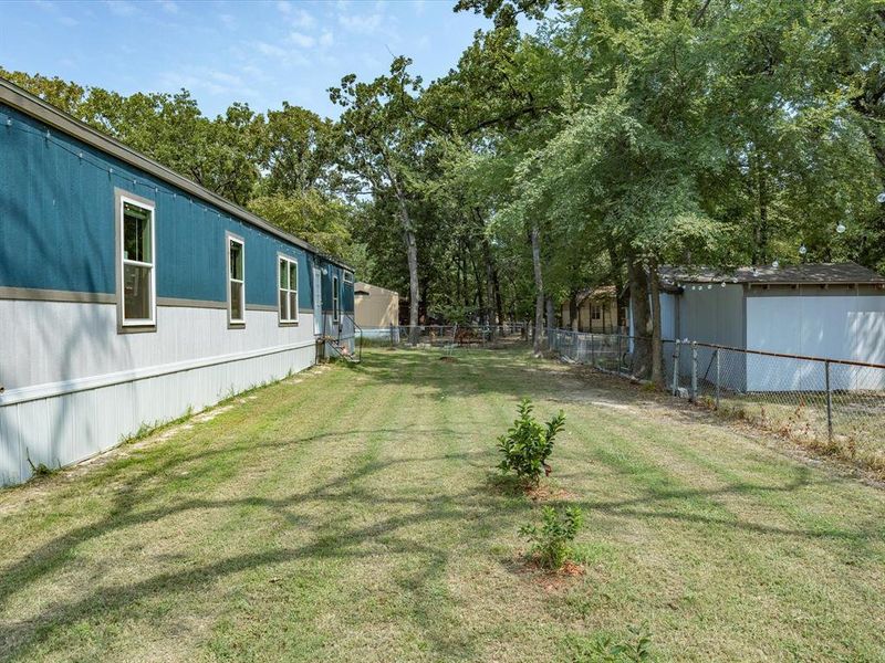 Front exterior of a new home in , Gun Barrel City, TX, highlighting curb appeal (Image 19). Front exterior of a new home in , Gun Barrel City, TX, highlighting curb appeal (Image 19).