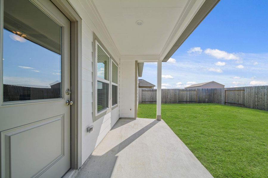 Exterior details and patio area of a home in Willow Trace 45' at Willow Trace, Spring (Image 21).