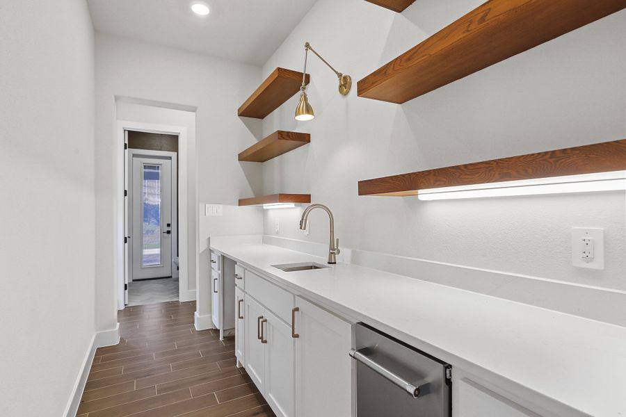 Furnished interior in a model home at Ranger Ridge in Strawn (Image 11).