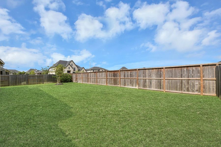 Large backyard perfect for outdoor living.