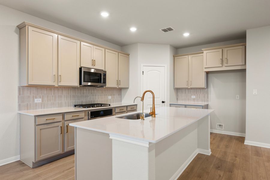 Representative furnished interior of a home built from the Lancaster by Ashton Woods in Berry Creek Highlands, Georgetown (Image 8).
