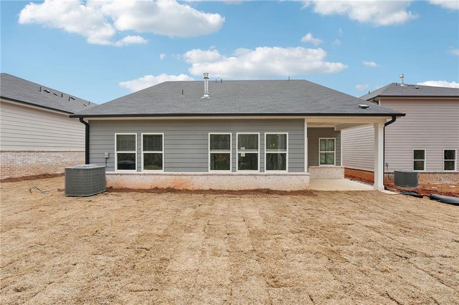 Exterior details and patio area of a home in Westmont Preserve, Powder Springs (Image 3).