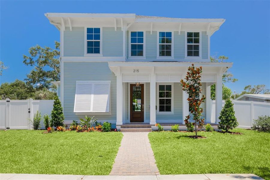 Front exterior of a new home in , St. Petersburg, FL, highlighting curb appeal (Image 5).