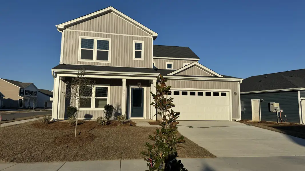 Front exterior of a new home in , Summerville, SC, highlighting curb appeal (Image 1). Front exterior of a new home in , Summerville, SC, highlighting curb appeal (Image 1).