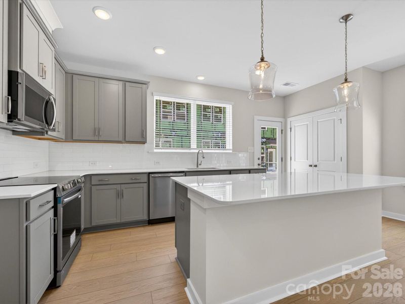 Furnished interior view inside a new home in Central Living at Craig, Charlotte (Image 11).