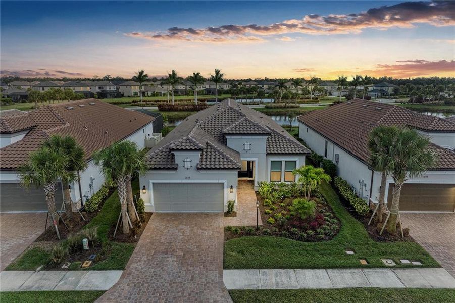Front exterior of a new home in , Sarasota, FL, highlighting curb appeal (Image 23). Front exterior of a new home in , Sarasota, FL, highlighting curb appeal (Image 23).