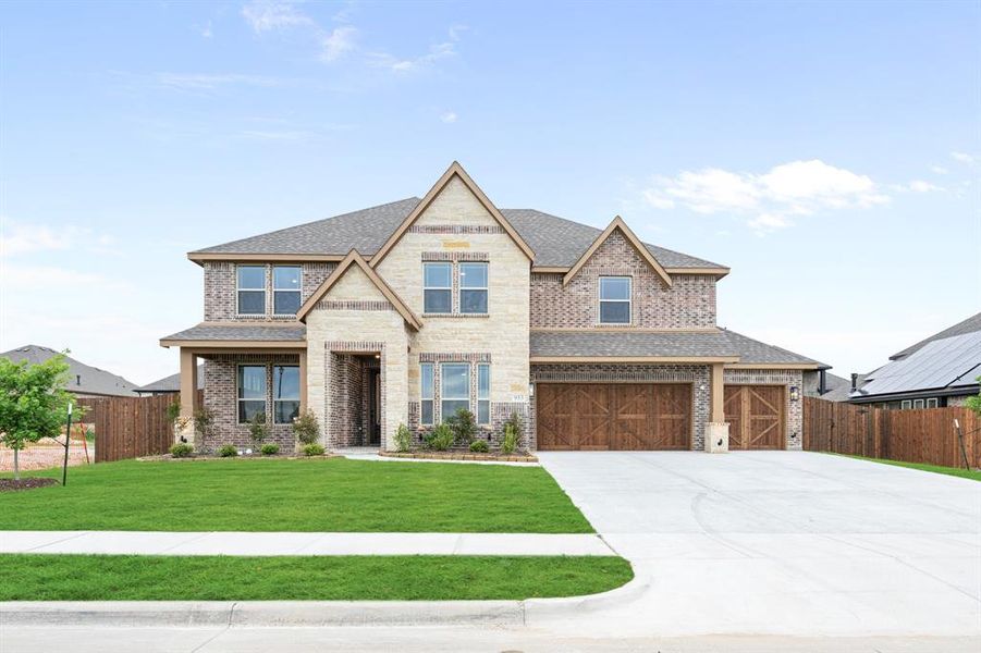 Front exterior of a new home in Homestead at Daniel Farms, DeSoto, TX, highlighting curb appeal (Image 1). Front exterior of a new home in Homestead at Daniel Farms, DeSoto, TX, highlighting curb appeal (Image 1).