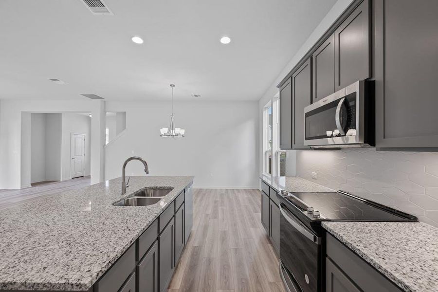 Furnished interior view inside a new home in Fleetwood, Dripping Springs (Image 8). Furnished interior view inside a new home in Fleetwood, Dripping Springs (Image 8).