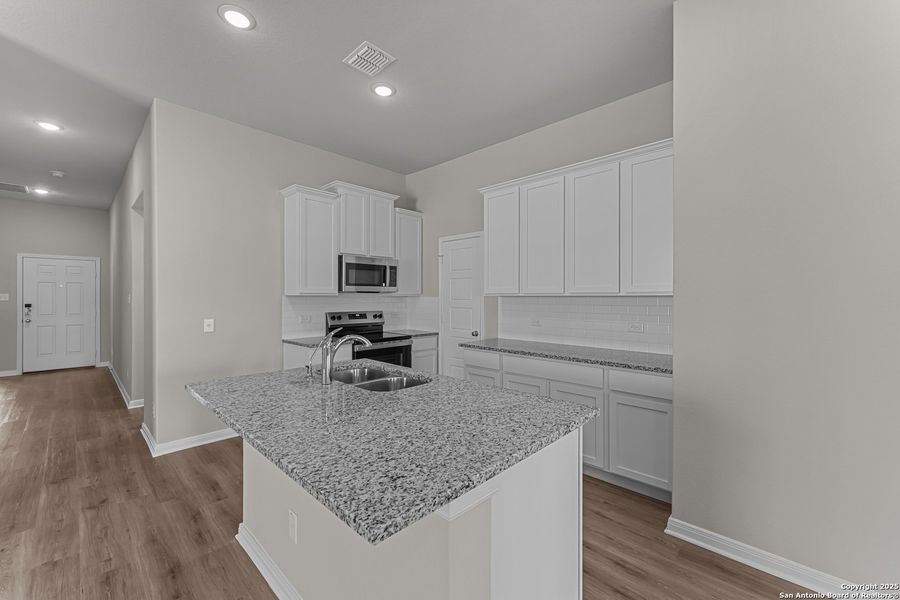 Furnished interior view inside a new home in Meadows at Clear Springs, New Braunfels (Image 7). Furnished interior view inside a new home in Meadows at Clear Springs, New Braunfels (Image 7).