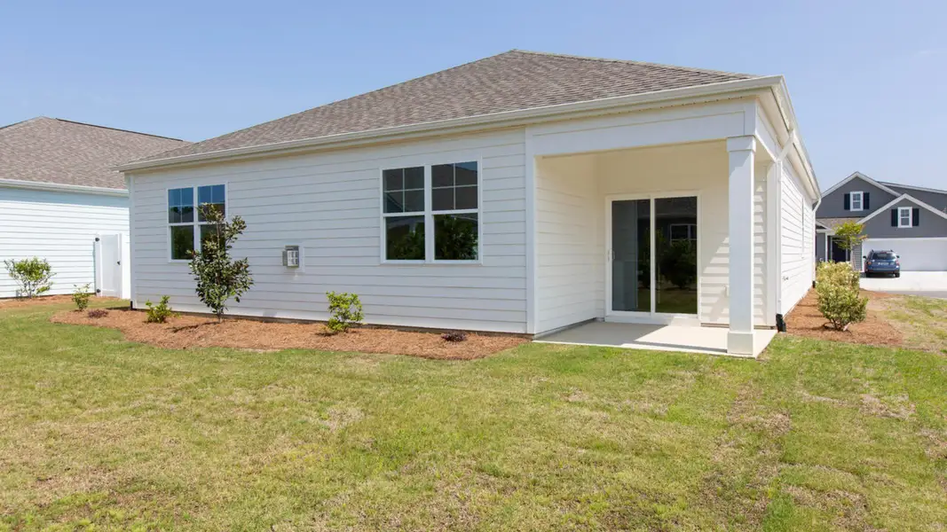 Exterior details and patio area of a home in Saltgrass Landing, Winnabow (Image 3).