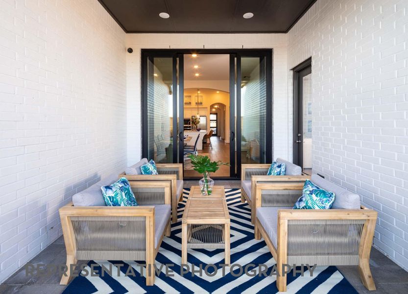 Exterior details and patio area of a home in Grand Central Park, Conroe (Image 2).