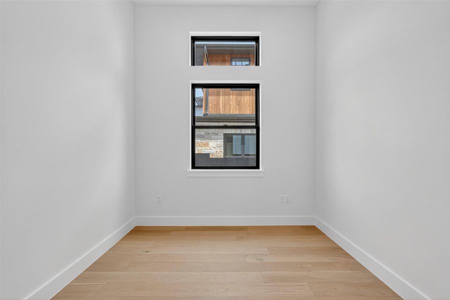 Spacious, unfurnished interior of a new home in Milky Way at River Place, Austin (Image 28).